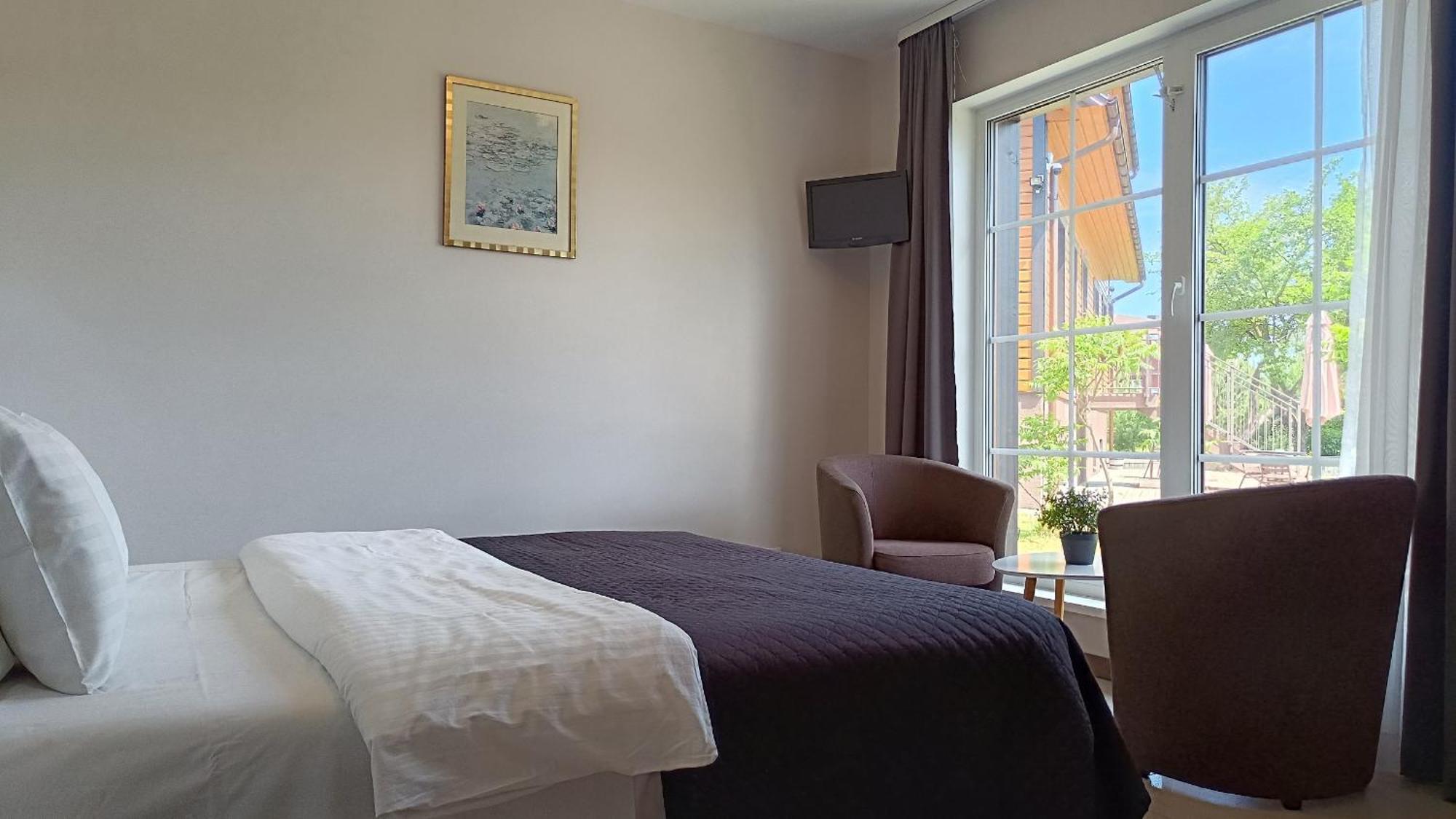 Hotel "Trakaitis" Nameliai Pokoj fotografie